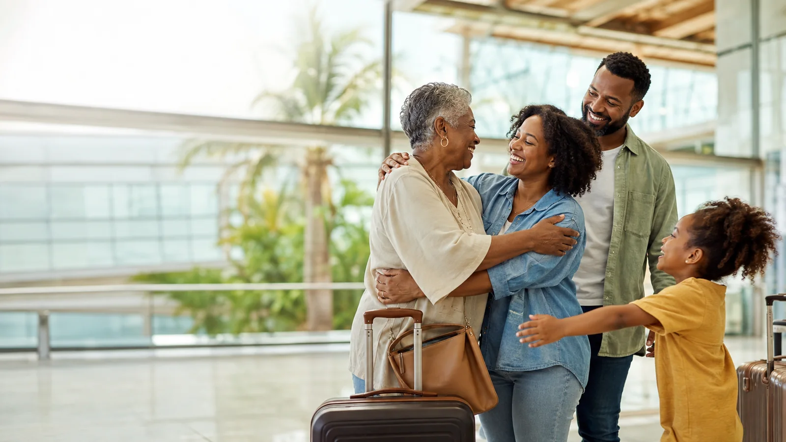 A family reuniting with luggage at an airport